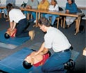 Erste Hilfe Kurs mit Teilnehmer bei der Reanimation