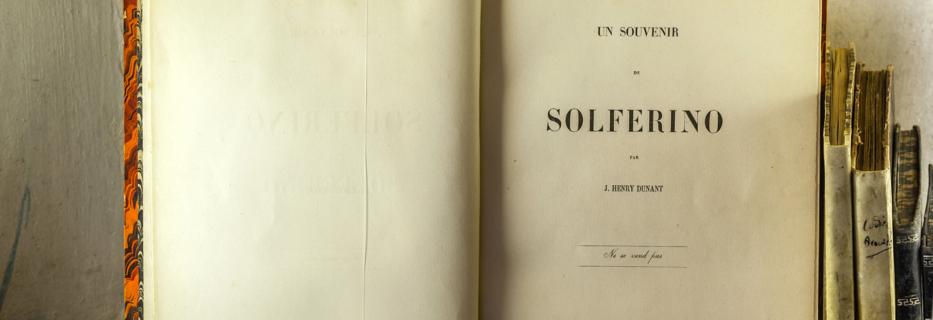 Geöffnetes Buch mit dem Titel Solferino